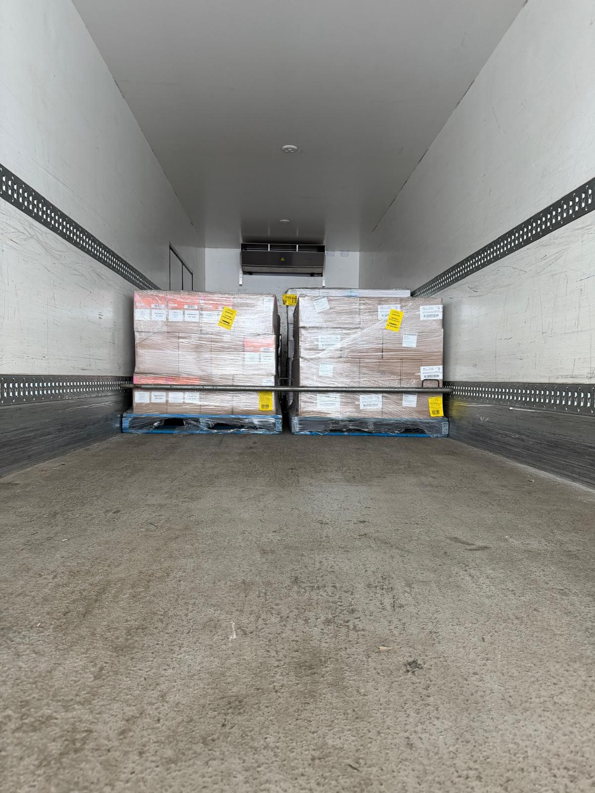 Palletised goods inside refrigerated truck